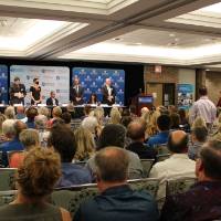 audience watches students and faculty recite the engineering pledge